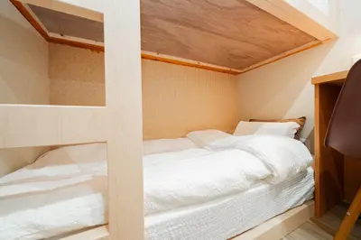 a bedroom with two bunk beds in it at Oshiage SAIEI Executive Apartments in Tokyo