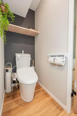 a bathroom with a white toilet in a room at Komorebi Asakusa Cozy 4P Stay The 77 House Tokyo in Tokyo