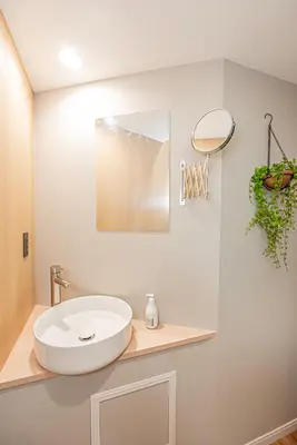 a bathroom with a white sink on a counter at Komorebi Asakusa Cozy 4P Stay The 77 House Tokyo in Tokyo