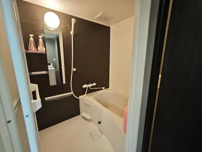 a bathroom with a sink and a bath tub at ZYZ Sakuradai House NR0259 in Tokyo