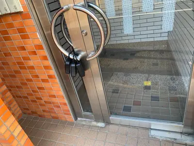 a door to a shower with a revolving door at 203 Koiwa Private House in Tokyo