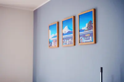 a group of four pictures hanging on a wall at SCD312 Eight subway lines connect to Tokyo business district, scarce 2 bathrooms, 2 toilets, warm space in Tokyo