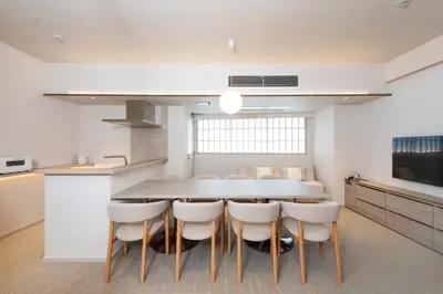 a kitchen and dining room with a table and chairs at ENT TERRACE Asakusabashi in Tokyo