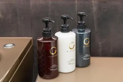 three bottles ofodorizers sitting on top of a counter at ENT TERRACE Asakusabashi in Tokyo