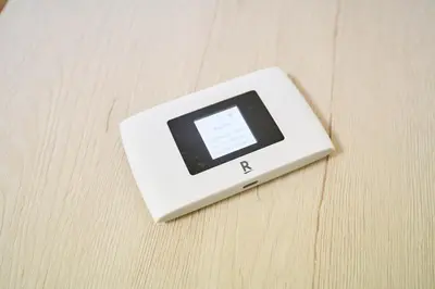 a electronic device sitting on top of a wooden table at \u5e73\u548c\u5cf6801 in Tokyo