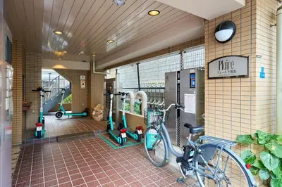 a bike parked in a building with a gym at \u5e73\u548c\u5cf6801 in Tokyo