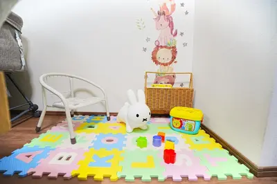 a childs play area with a toy floor in a room at Nakano Cozy House\u4e2d\u91ce\u30b3\u30fc\u30b8\u30fc\u30cf\u30a6\u30b9 in Tokyo