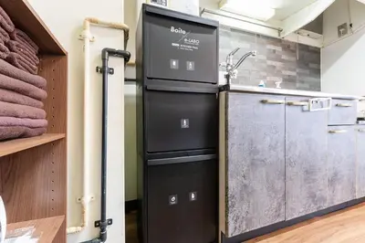 a kitchen with a refrigerator and a sink at tai\u4e21\u56fd4\u4e01\u76eeGLV\u516c\u9928401 in Tokyo