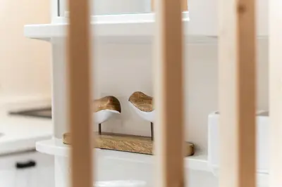 a close up of two wooden spoons in a cage at tai\u4e21\u56fd4\u4e01\u76eeGLV\u516c\u9928701 in Tokyo