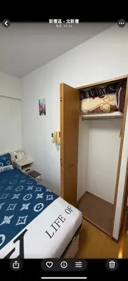 a small bedroom with a bunk bed and a bunk bed at \u6771\u4eac\u6fd5\u6696\u7684\u5bb6-Tokyo Warm Home -28 Square King Room205 in Tokyo