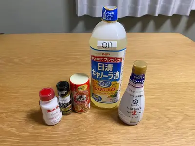 a large bottle of milk and four spices on a table at Direct bus from Haneda 3BR House Near Station in Tokyo