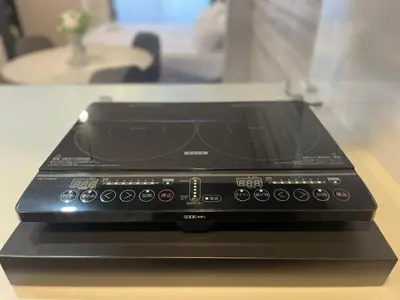 a laptop computer sitting on top of a table at Arte Retreat Tokyo in Tokyo