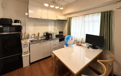 a kitchen with a table with a blue animal on it at Moto Sakura for families 3 luxury beds 2bedroom apartment in a quiet and convenient location in Tokyo
