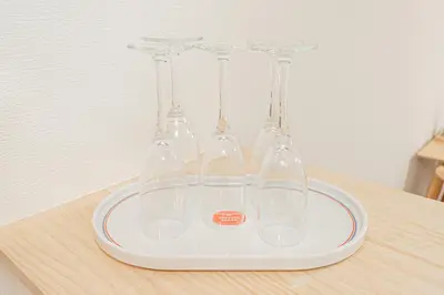 a group of wine glasses on a plate on a table at Mori house \u6839\u5cb8 401 in Tokyo