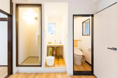 a bathroom with a shower and a toilet at Azur Shibuya -Apartment House- in Tokyo