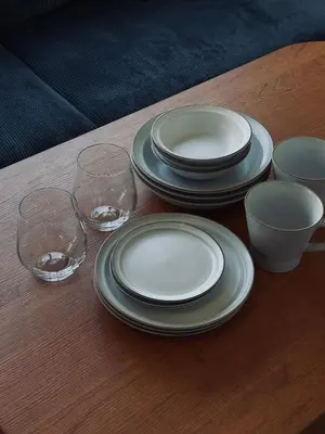 a table with plates and wine glasses on it at \u30c8\u30e9\u30a4\u30a2\u30f3\u30b0\u30eb\u82e5\u5bae201 trianglewakamiya in Tokyo