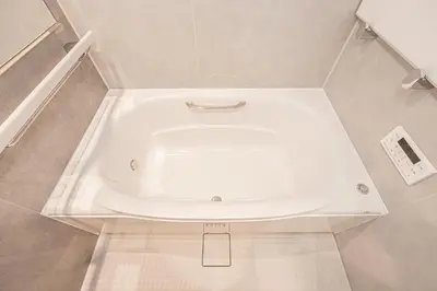 a bathroom with a bath tub in the floor at Mori house \u6839\u5cb8 402 in Tokyo