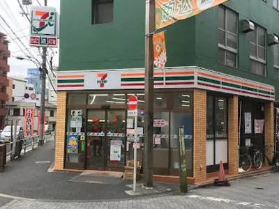 a store on the corner of a city street at Sakura Fan 2F in Tokyo