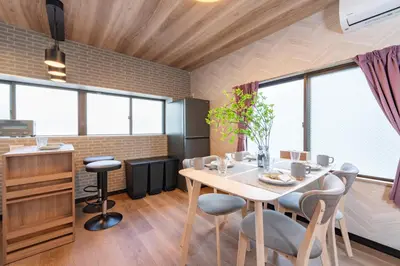 a dining room with a table and chairs at Comfort Stay \u4e2d\u91ce in Tokyo