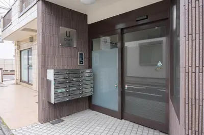 a store front with a glass door in a building at Laputa \u6c60\u888b in Tokyo