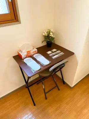 a table with gifts and flowers on top of it at Walk to Ikebukuro! 5min to Higashi-Ikebukuro Sta, Free Wi-Fi & Washer-Dryer in Tokyo