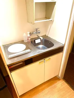 a bathroom with a sink and a mirror at Walk to Ikebukuro! 5min to Higashi-Ikebukuro Sta, Free Wi-Fi & Washer-Dryer in Tokyo