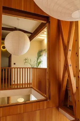 a room with wooden walls and a ceiling with wooden beams at Two-Story Japandi Villa in Tokyo in Tokyo