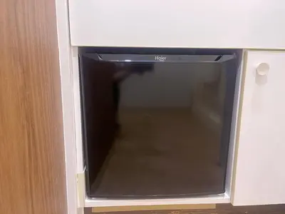 a microwave oven sitting inside of a cabinet at New \u6b4c\u821e\u4f0e\u753a222 \u6771\u65b0\u5bbf\u99c5\u5f92\u6b699\u5206 \u4f0a\u52e2\u4e39\u65b0\u5bbf\u5f92\u6b69 8\u5206 \u65b0\u5bbf\u5fa1\u82d1\u5f92\u6b6914\u5206 in Tokyo