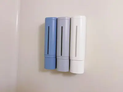 three blue and white cylinders on a white wall at New \u6b4c\u821e\u4f0e\u753a222 \u6771\u65b0\u5bbf\u99c5\u5f92\u6b699\u5206 \u4f0a\u52e2\u4e39\u65b0\u5bbf\u5f92\u6b69 8\u5206 \u65b0\u5bbf\u5fa1\u82d1\u5f92\u6b6914\u5206 in Tokyo