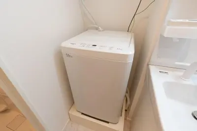 a toilet in a bathroom next to a sink at \u661f\u7a7a\u3068Riviere in Tokyo