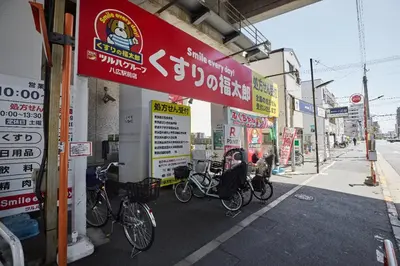 a group of bikes parked in front of a building at \u661f\u7a7a\u3068Riviere in Tokyo