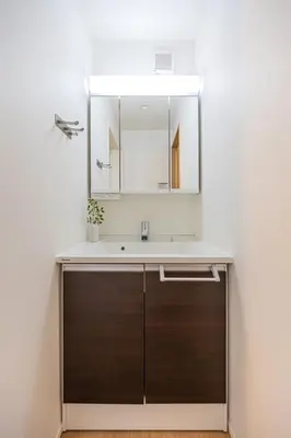 a bathroom with a sink and a mirror at Skytree View! Modern Entire House in Tokyo in Tokyo