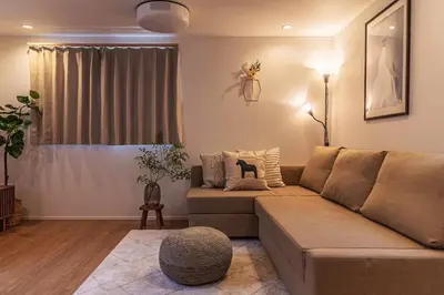 a living room with a couch and a table at Skytree View! Modern Entire House in Tokyo in Tokyo