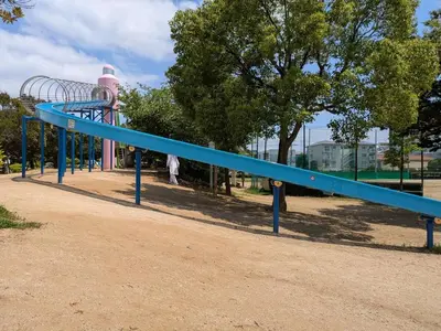 a blue slide at a playground in a park at Vacation Rental -Nagumo301- in Tokyo