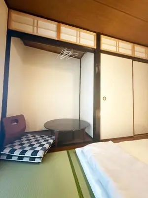 a small room with a bed and a table at Authentic Tatami Quiet Night Ebisu in Tokyo