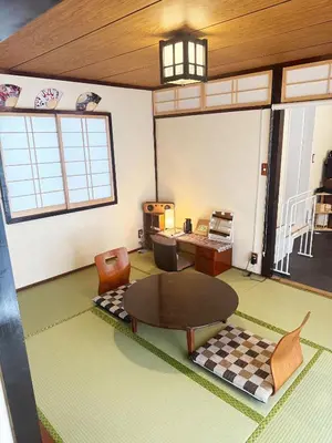 a rendering of a living room with a table at Authentic Tatami Quiet Night Ebisu in Tokyo