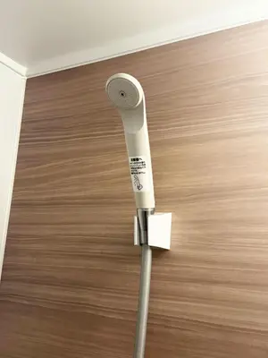 a hair dryer in a room with a wooden floor at Authentic Tatami Quiet Night Ebisu in Tokyo