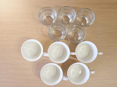 a group of cups and glasses on a table at Sakura Wave Stay-Direct Shinjuku 15min & Shibuya 25min in Tokyo