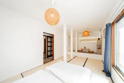 a white room with a bed and a window at 3BR,2BA,2WC with kitchen and living,7min to skytree subway,Max12P in Tokyo