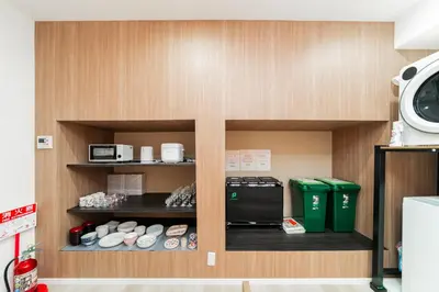 a kitchen with a shelf with a microwave and other items at 3BR,2BA,2WC with kitchen and living,7min to skytree subway,Max12P in Tokyo
