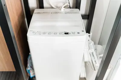 a white stove top oven sitting on top of a refrigerator at 3BR,2BA,2WC with kitchen and living,7min to skytree subway,Max12P in Tokyo