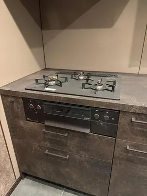 a stove top oven sitting in a kitchen at EKVOLI ROPPONGI TOKYO, Private Hotel in Tokyo