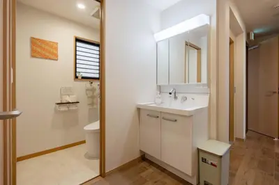 a bathroom with a sink and a toilet at Clover House in Tokyo