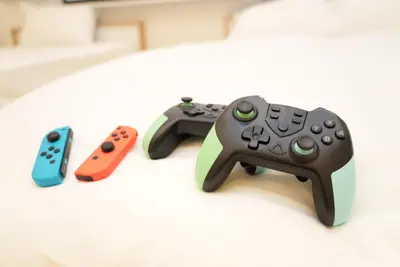 three video game controllers sitting next to each other at SIC Hotel Shinjuku - Shin Nakano in Tokyo