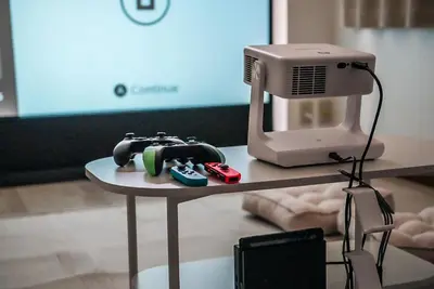 a table with a sewing machine and a computer on it at SIC Hotel Shinjuku - Shin Nakano in Tokyo