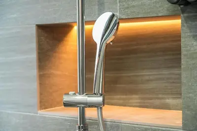 a stainless steel spatula in front of a wall at SIC Hotel Shinjuku - Shin Nakano in Tokyo
