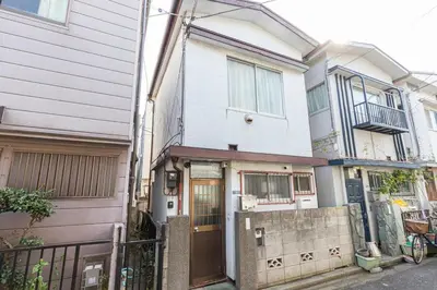 a house with a gate in front of it at \u9418\u30f6\u6df5Stay in Tokyo