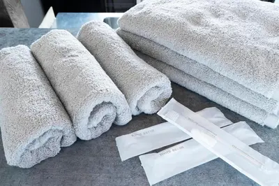 a pile of towels sitting on a table at \u9418\u30f6\u6df5Stay in Tokyo