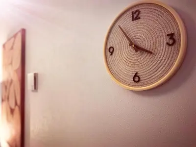 a clock is hanging on a wall at Mossy Nest Negishi I \u9daf\u8c37\u99c5\u5f92\u6b697\u5206 \u4e0a\u91ce\u5f92\u6b69\u570f\u5185 in Tokyo