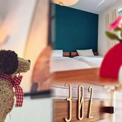 a room with two beds and a table with a drawer at Mossy Nest Negishi I \u9daf\u8c37\u99c5\u5f92\u6b697\u5206 \u4e0a\u91ce\u5f92\u6b69\u570f\u5185 in Tokyo